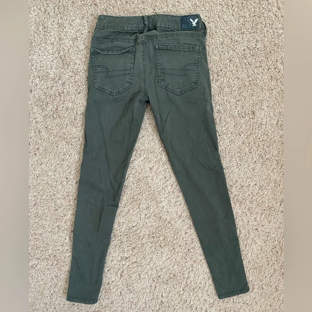 American Eagle Distressed Green Jeggings size 2